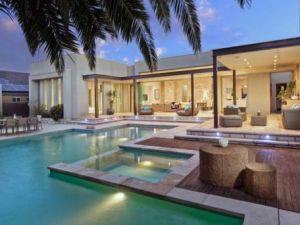 Julia Gillard - new Adelaide home - backyard pool spa and outdoor kitchen.jpg